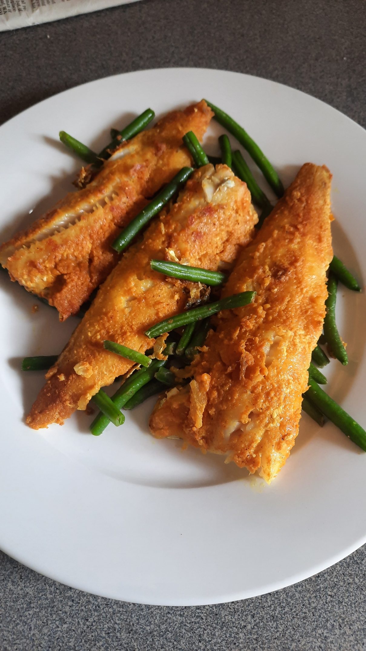 Turmeric-coated fish
